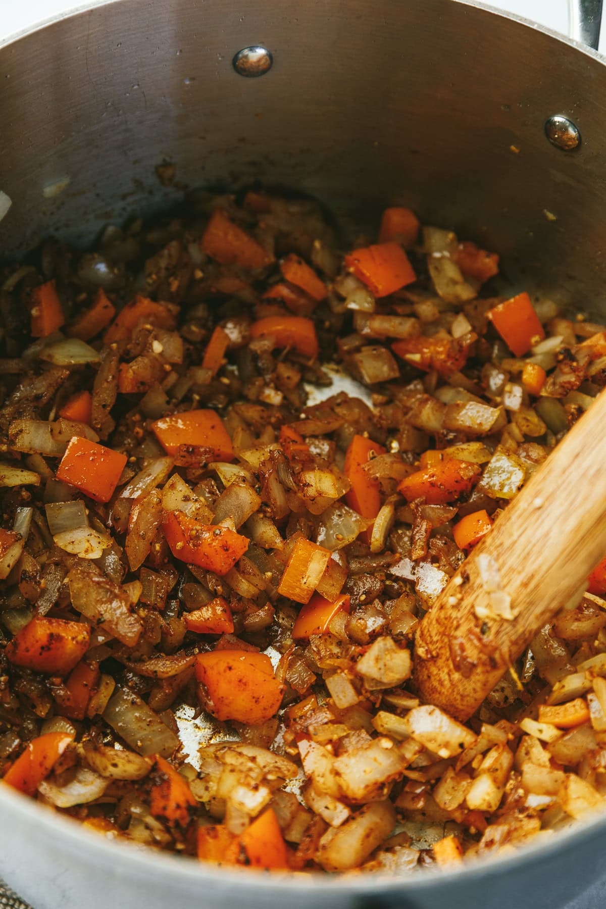 Chopped veggies in a pot for keto chicken tortilla soup.
