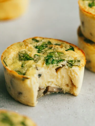 Truffle egg bite with a bite taken out of it.