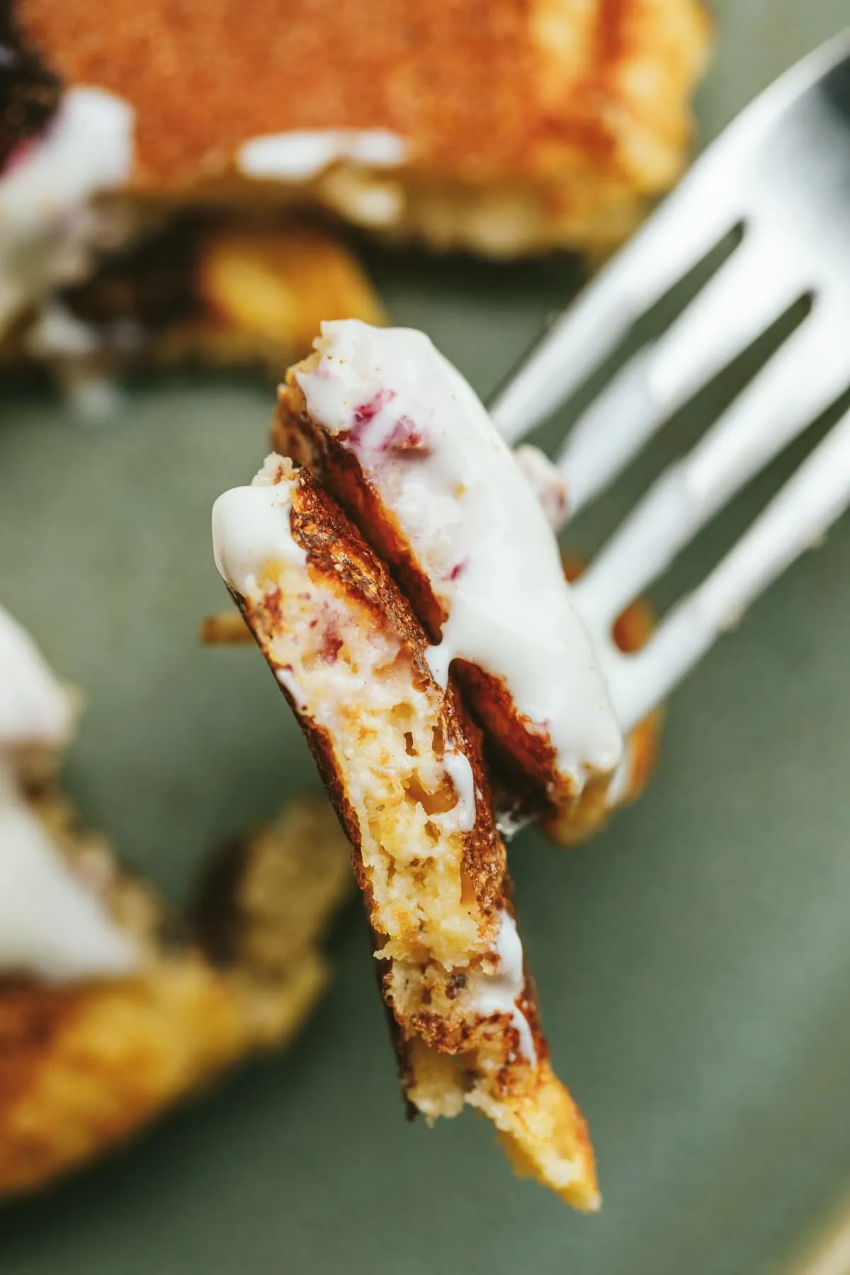 Closeup of a bite of keto cottage cheese pancake bite on a fork.