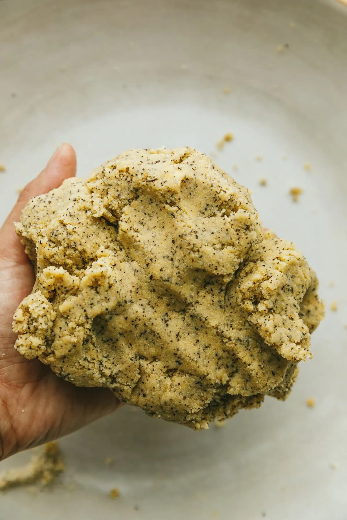 Holding the earl grey scone dough after mixing.