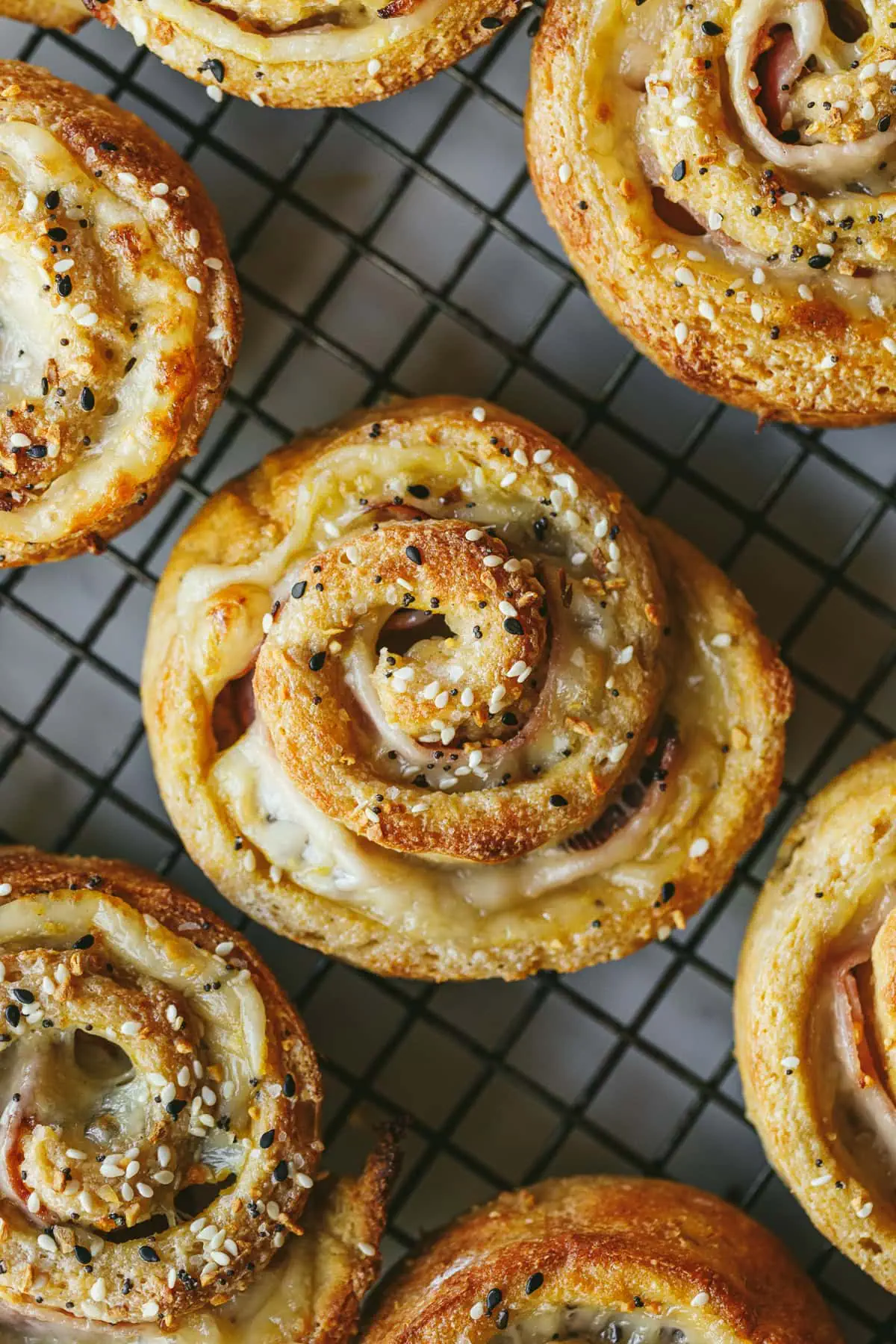 Low-carb pinwheels on a cooling rack.