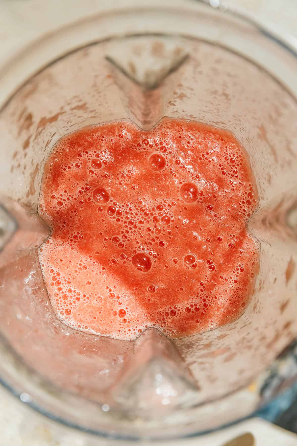 Watermelon basil seed drink in a blender.