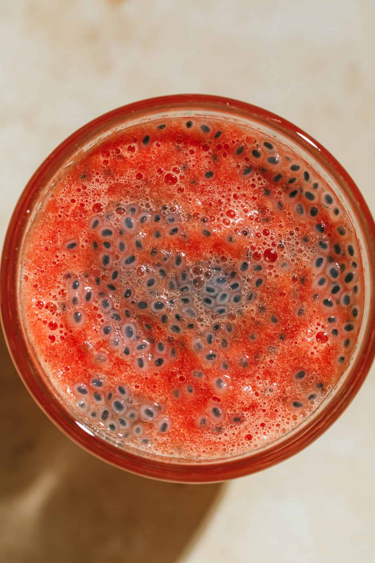 Watermelon basil seed seed drink closeup that shows seeds on top.