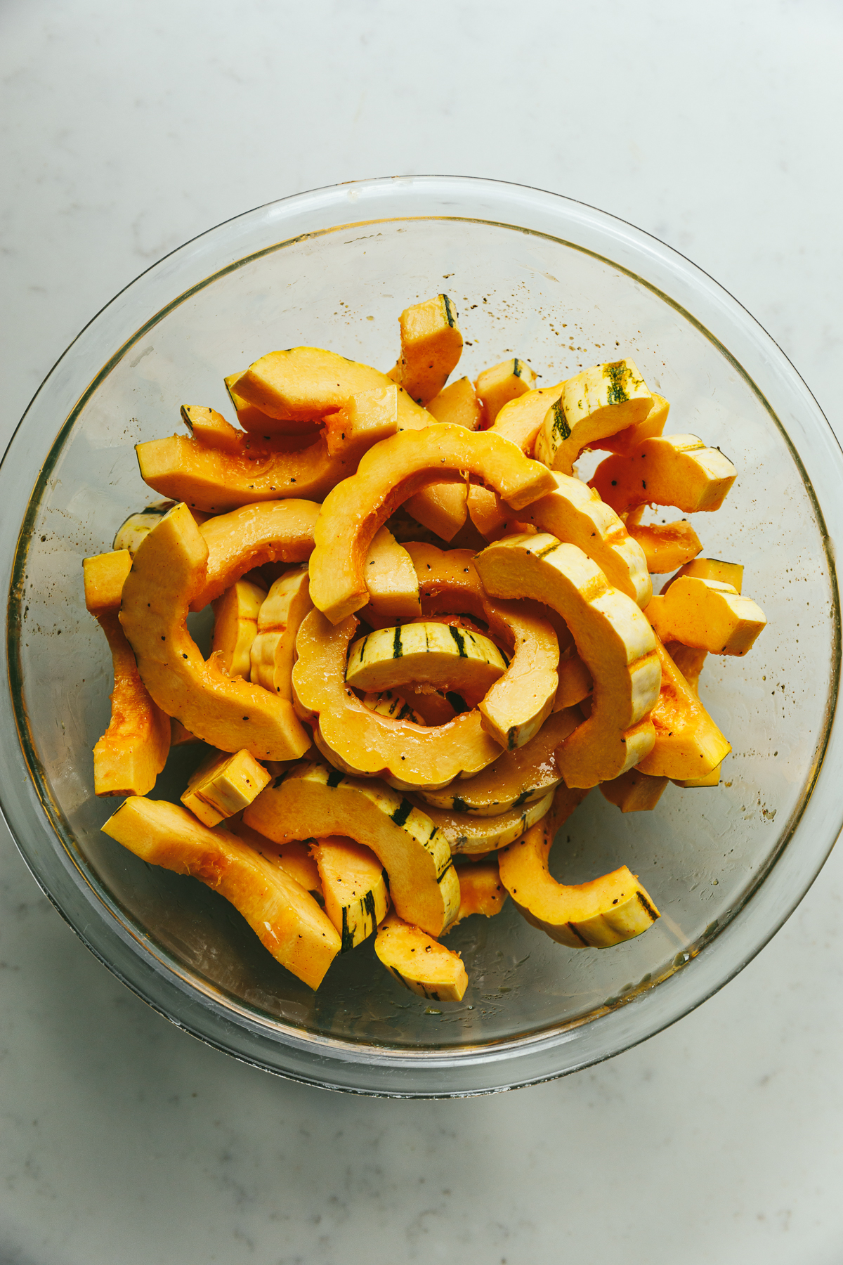 Delicata squash rings in a glass bowl.